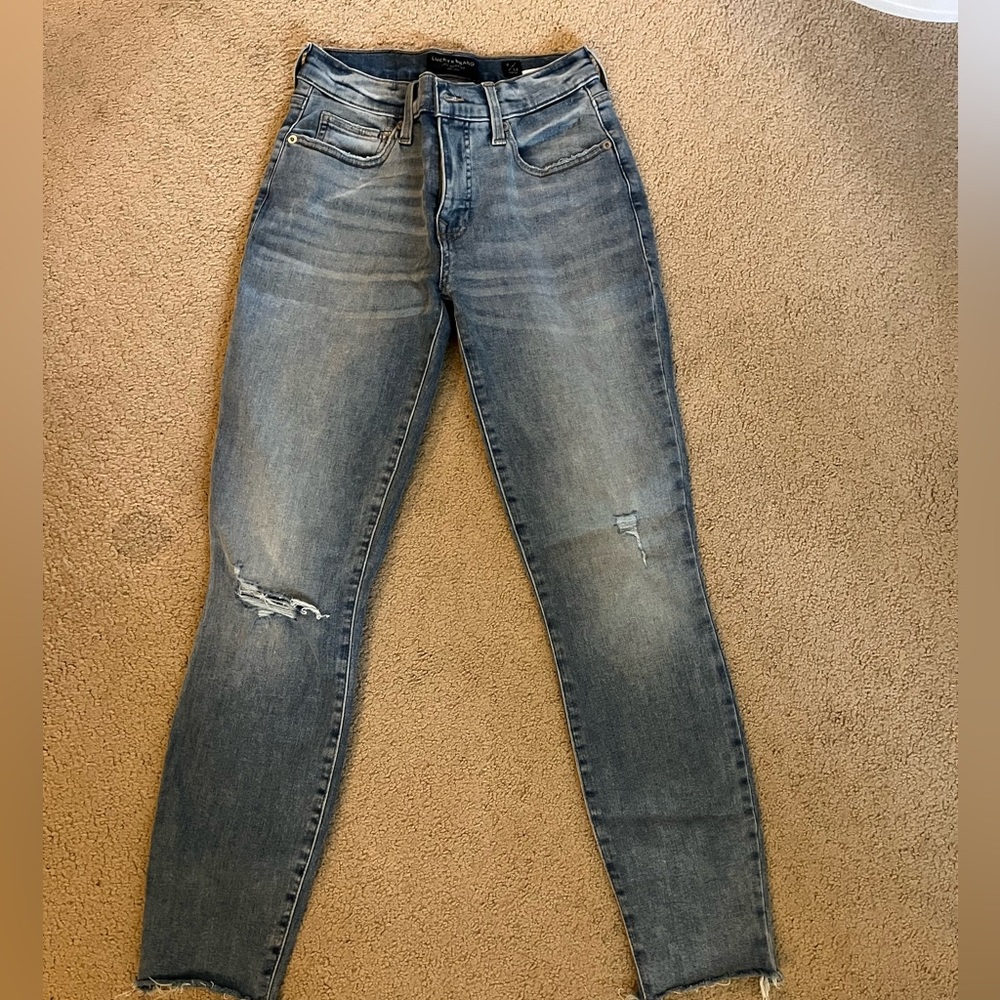 Lucky brand skinny jeans with a few rips, Ava style